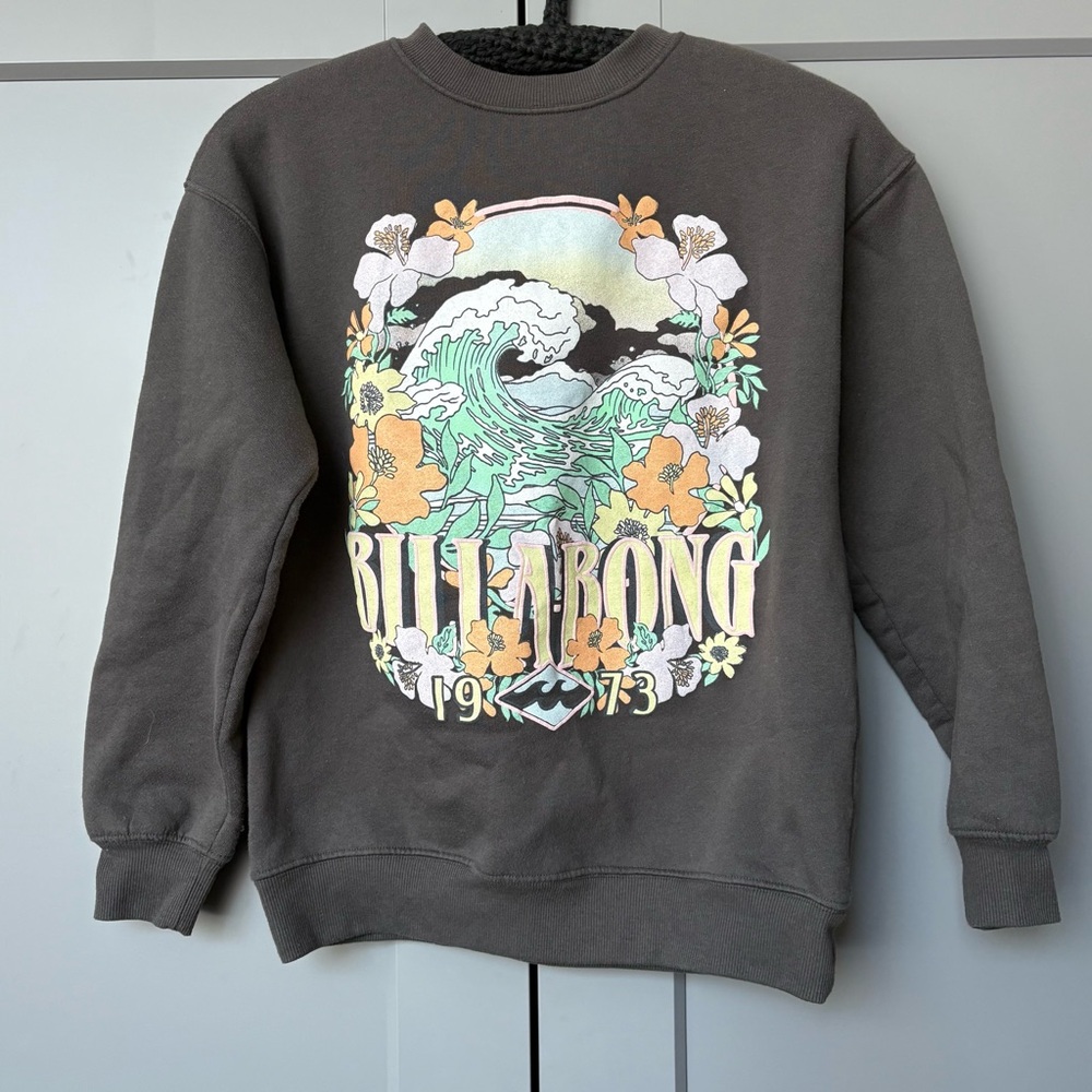 Billabong dark crewneck sweatshirt with pastel surfer print